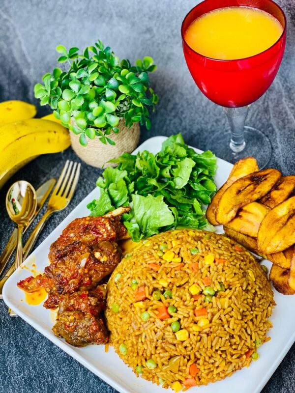 jolllof rice platter with turkey (served with diced plantain and coleslaw)