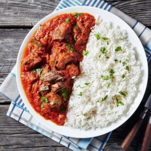 white rice with stewed chicken